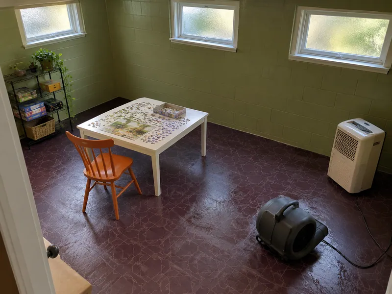 Water Extraction in Victoria equipment on a damp floor after bulk pickup